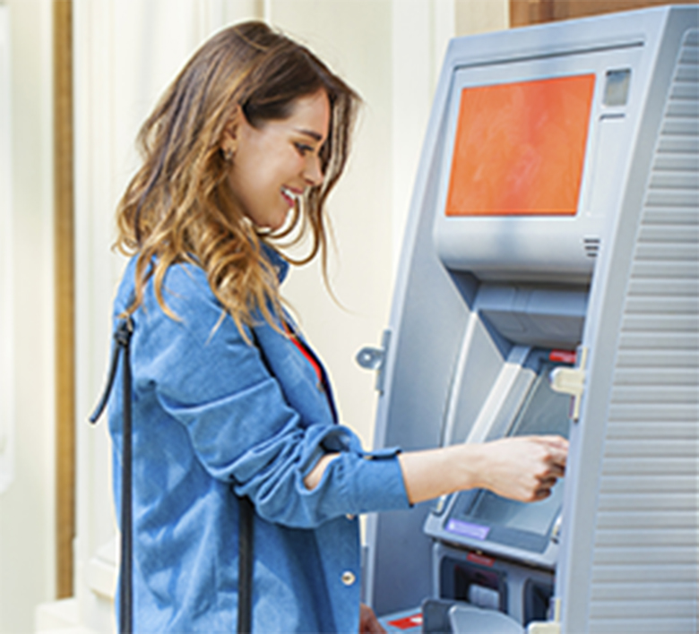 woman using atm